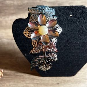 Beautifully detailed leaf and flower headband.